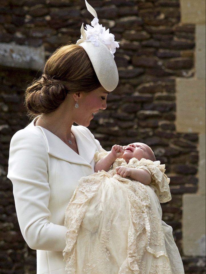  Kate Middleton soothes Princess Charlotte at her christening at St Mary Magdalene Church in Sandringham in 2015 - where her grandmother Princess Diana was baptised in 1961