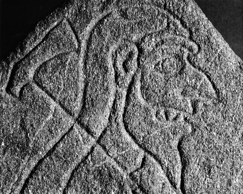  This Pictish carving shows a man with an axe