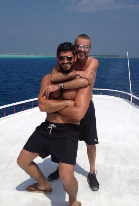  George Michael's family are reluctantly considering letting boyfriend Fadi Fawaz stay in the late singer's former London mansion