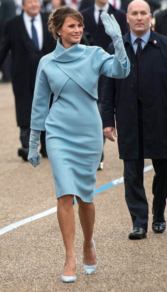 Melania Trump waving at the presidential inauguration parade.