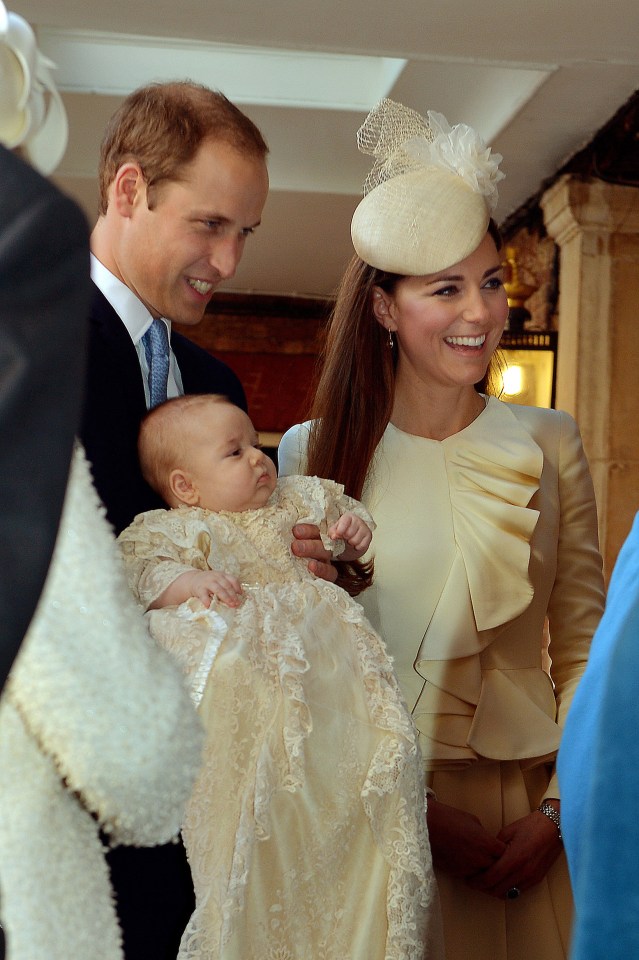  The Duke and Duchess of Cambridge pictured speaking to The Queen at George's christening