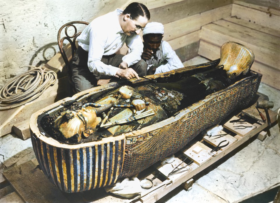  Archaeologist Howard Carter removing oils from the coffin of Tutankhamun in the 1920s