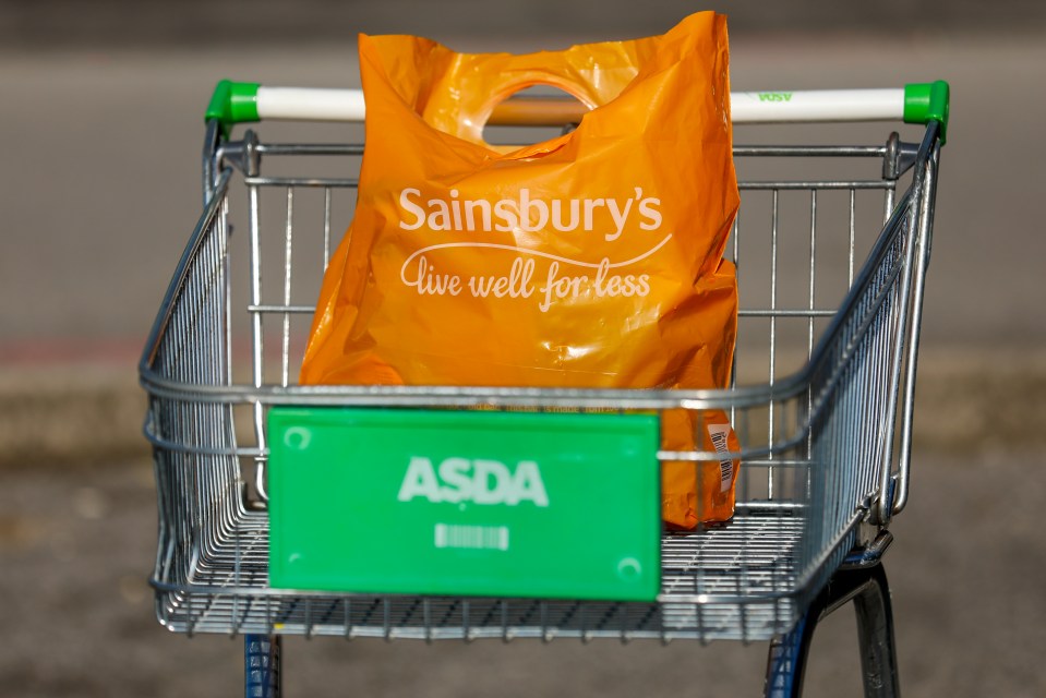  The merger between supermarkets Asda and Sainsbury's may not happen for as long as ten years