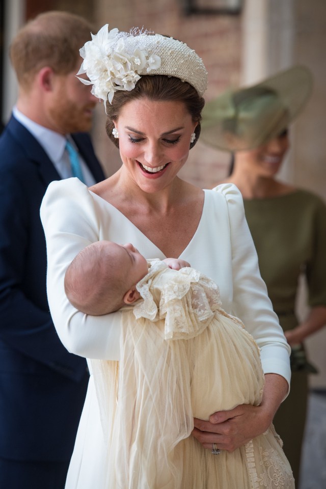  Kate Middleton carries Prince Louis into St James's Palace for his christening in 2018