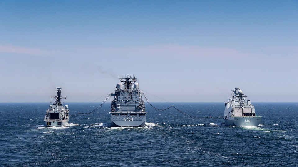  Pictured: (L-R) HMS Kent, FGS Berlin and HDMS Absalon conduct a three ship replenishment at sea