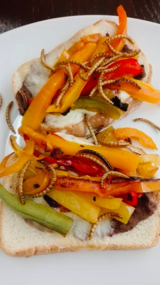  Pictured are meal worms used as a garnish for a sandwich