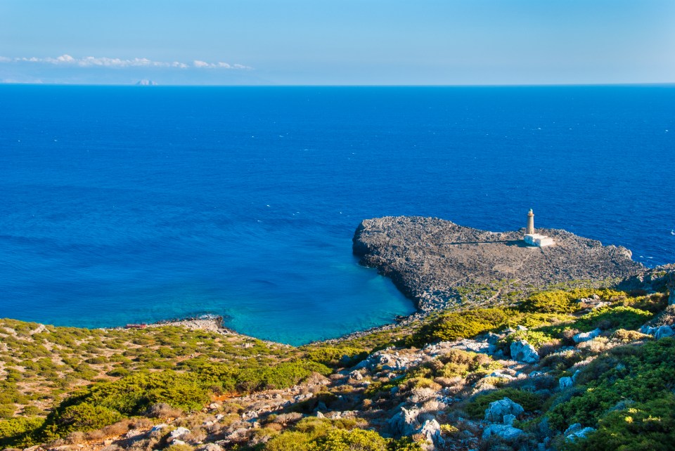 A Greek island is offering people a free plot of land and £450 per month to live there