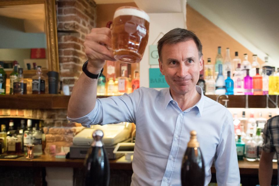  Jeremy Hunt raises a pint. An anonymous Tory donor has paid £300,000 for dinner with either him or Mr Johnson