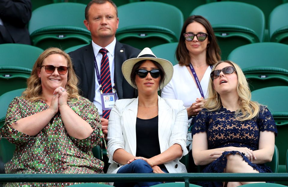  Meghan Markle attended Wimbledon with two friends last week, with security behind her