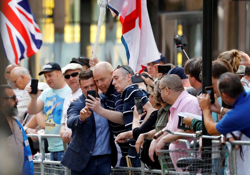  Earlier the former EDL leader made time for some selfies with supporters outside the court