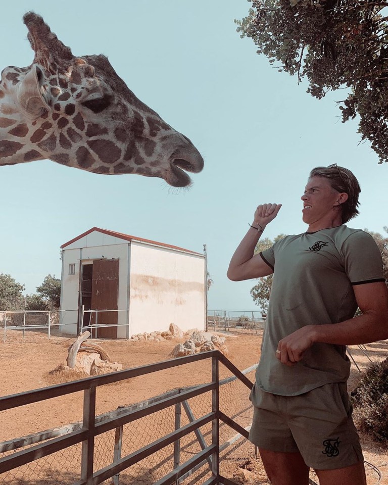 Gallagher, pictured at Paphos Zoo, is a popular figure in the Chelsea academy 