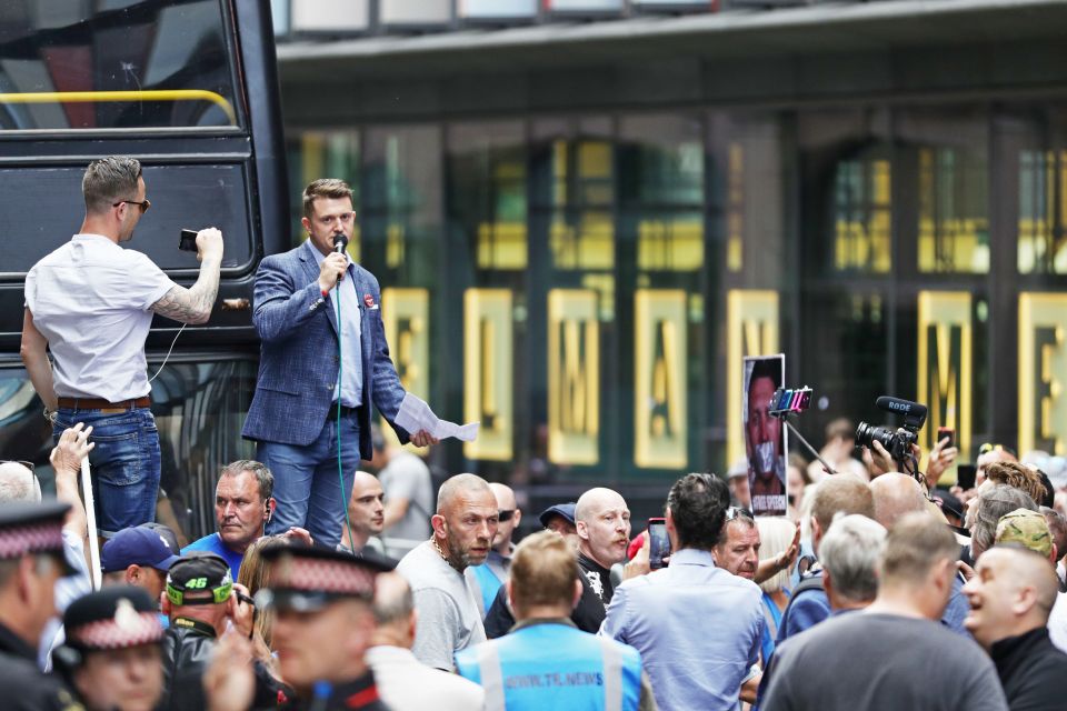  Robinson - real name Stephen Yaxley-Lennon - addressing angry crowds outside court today