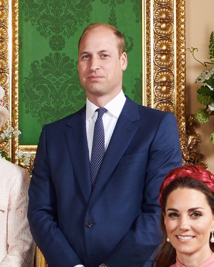 Prince William looked like he was in nightclub bouncer mode, body language experts said