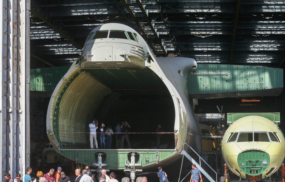  Journalists and visitors look at the fuselage of Ukrainian Antonov An-225 aircraft