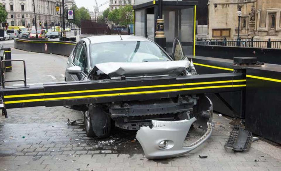  The car hit a security barrier outside the Houses of Parliament