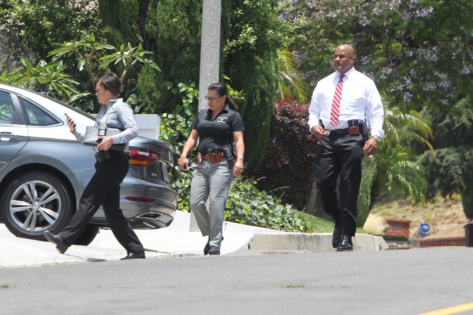  Cops arrive at Sturridge's Hollywood mansion to gather evidence