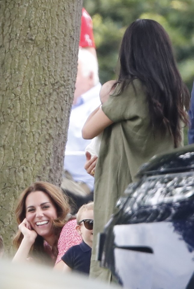 Kate Middleton laughs as little Louis makes faces at Meghan Markle and his cousin Archie