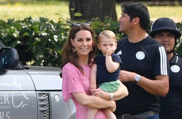 Kate Middleton hugs her youngest child at the polo