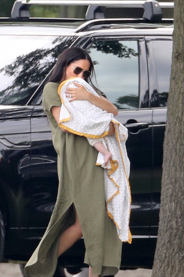 Meghan Markle swaddled baby Archie in a £33 organic cotton blanket for polo trip