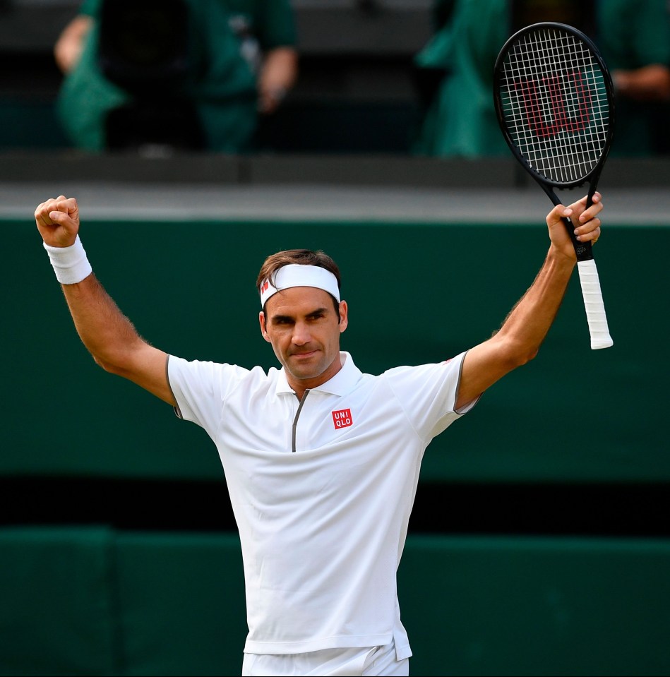 Roger Federer celebrates after securing his place in the Wimbledon semi-finals