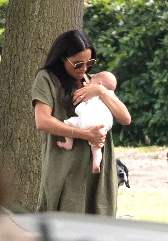 Meghan cradled little Archie, who was born on May 6