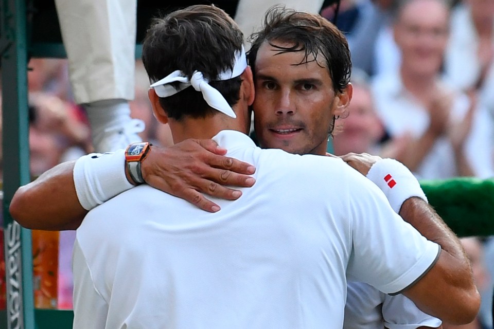 Nadal embraces Federer after his loss on Centre Court