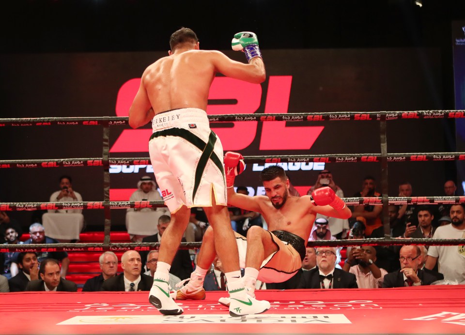 Amir Khan proved far too good for a gallant, yet outclassed Billy Dib