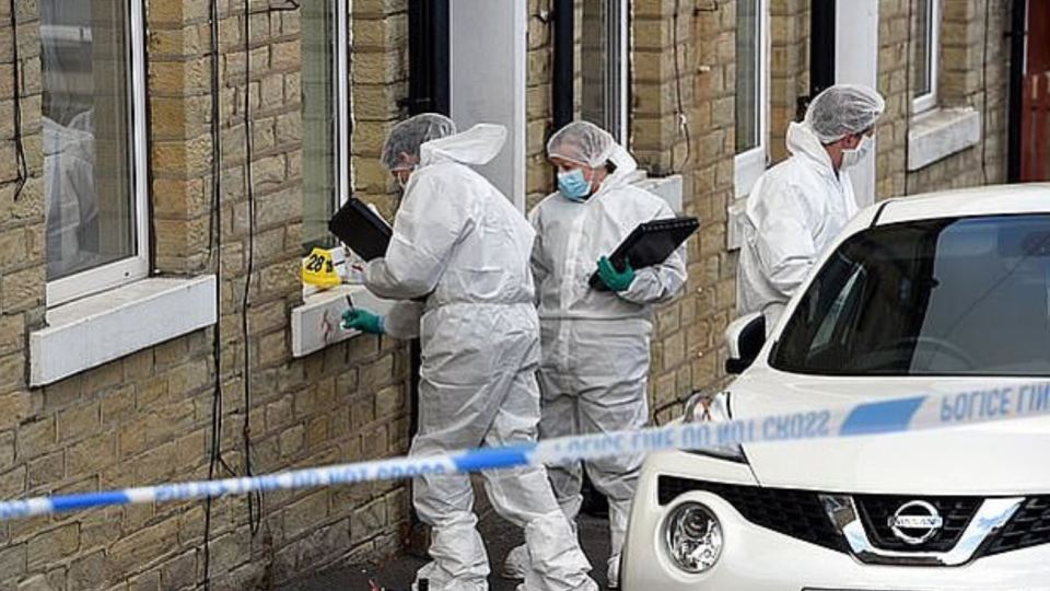  Forensic teams are pictured searching for vital evidence the day Jamie Brown was killed