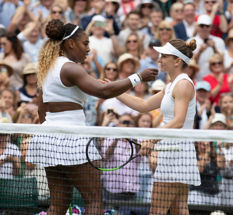  Williams congratulates Halep at the net after their final