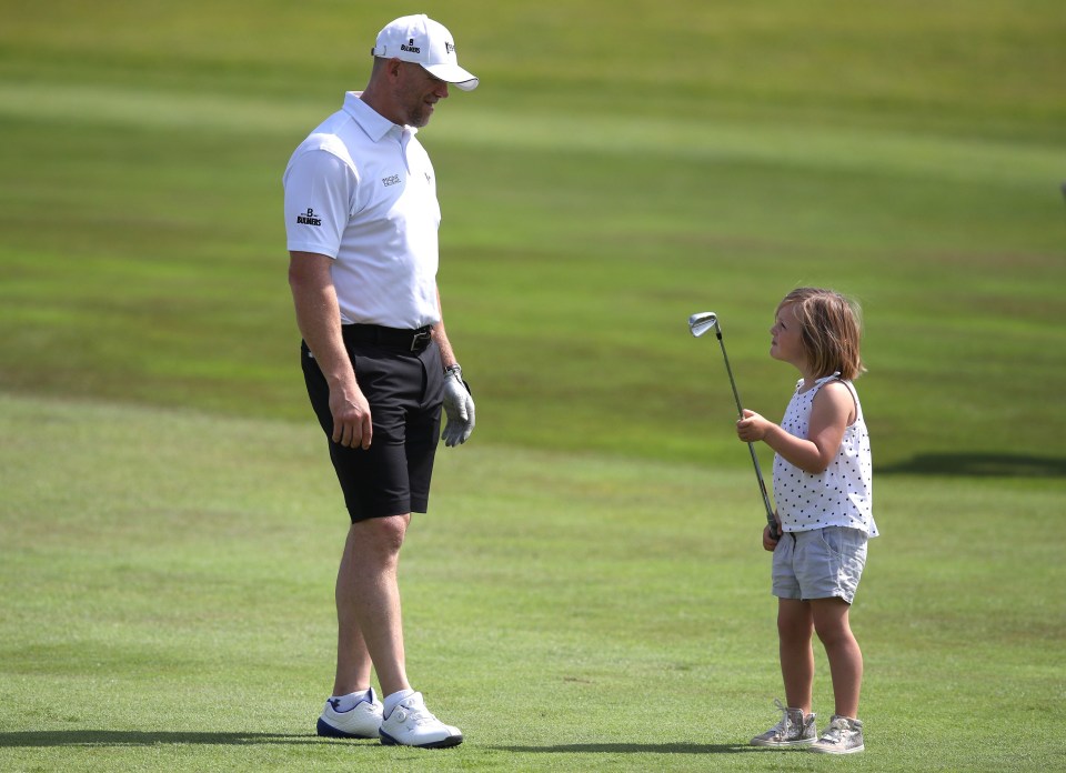 Mike Tindall and Zara Phillip’s mischievous daughter Mia has been spotted playing with her dad at a celebrity golf tournament