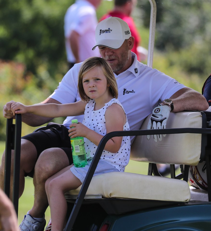 She rode with her dad in a golf buggy