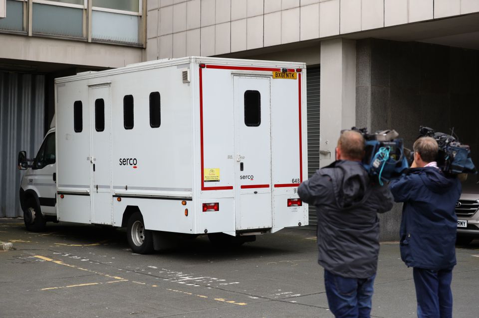 McKenzie arrives at Camberwell Green Magistrates Court in the back of a prison van this morning