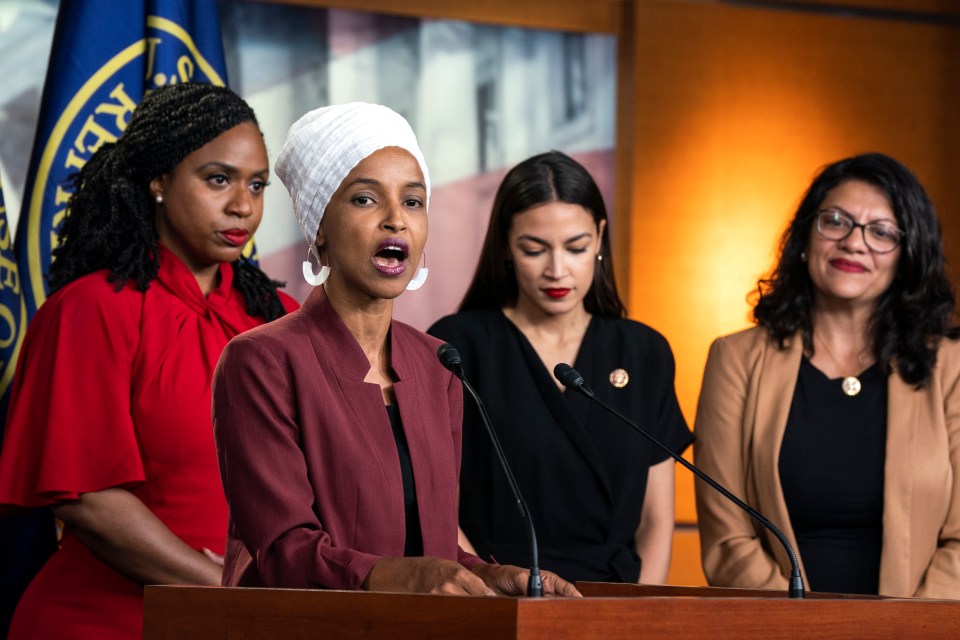  Democratic Representatives Ayanna Pressley (left), Ilhan Omar (centre left), Alexandria Ocasio-Cortez (centre right), and Rashida Tlaib (right), speak about President Trump's attacks against them