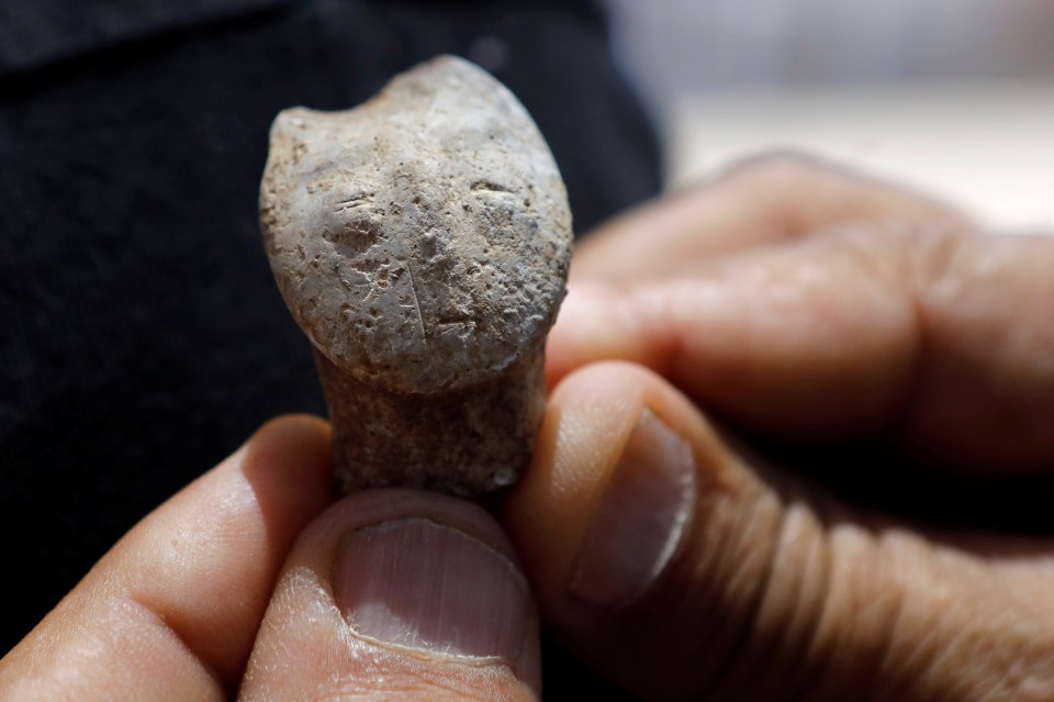  A carving of an animal head reveals the city's inhabitants sophistication