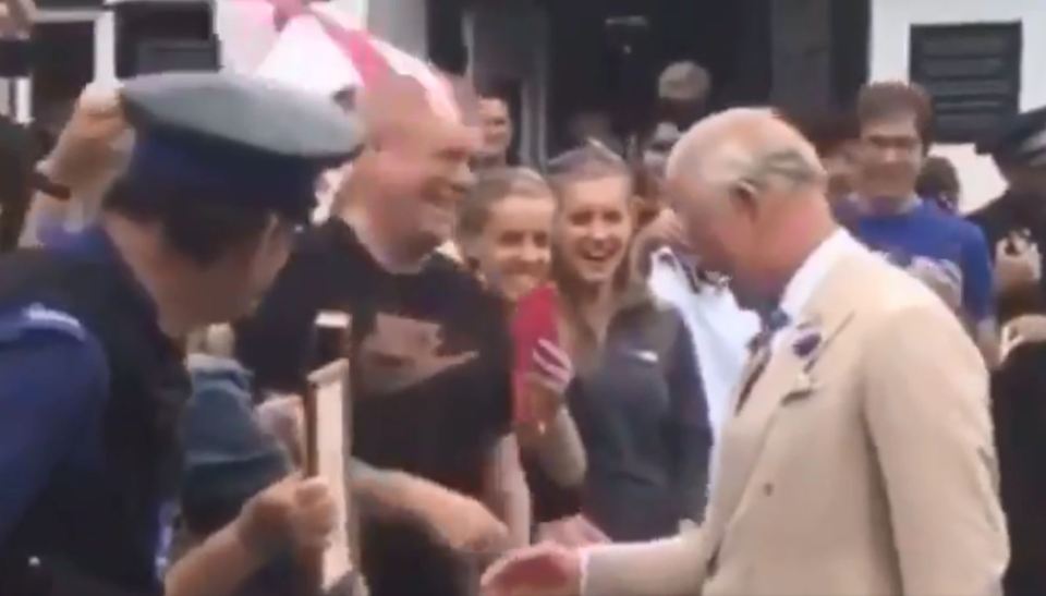  Charles and the well-wisher chuckled after the rogue royal greeting