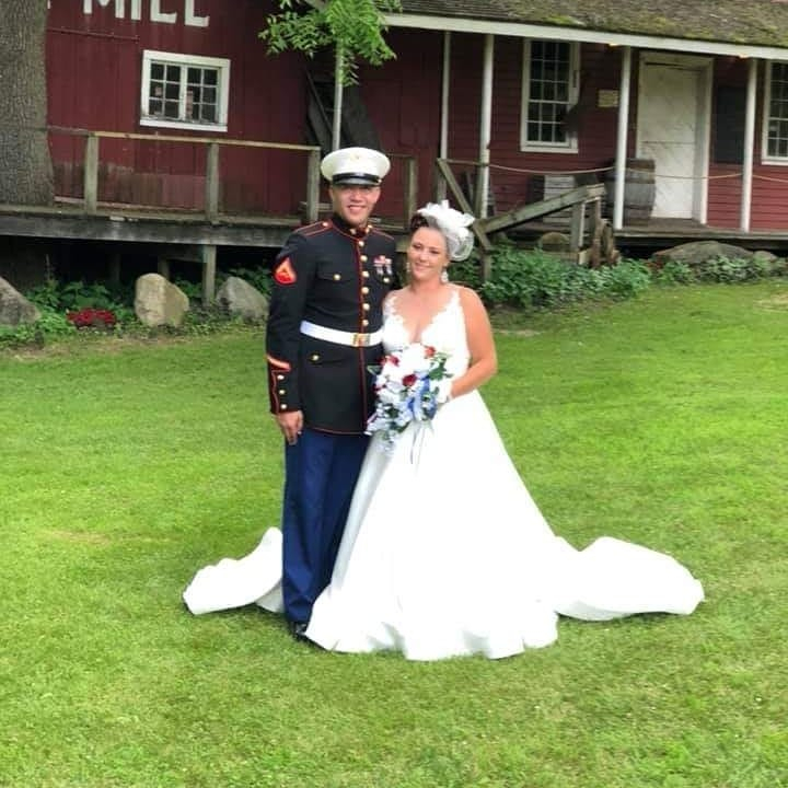  Audra walked down the isle in a traditional white dress before getting changed