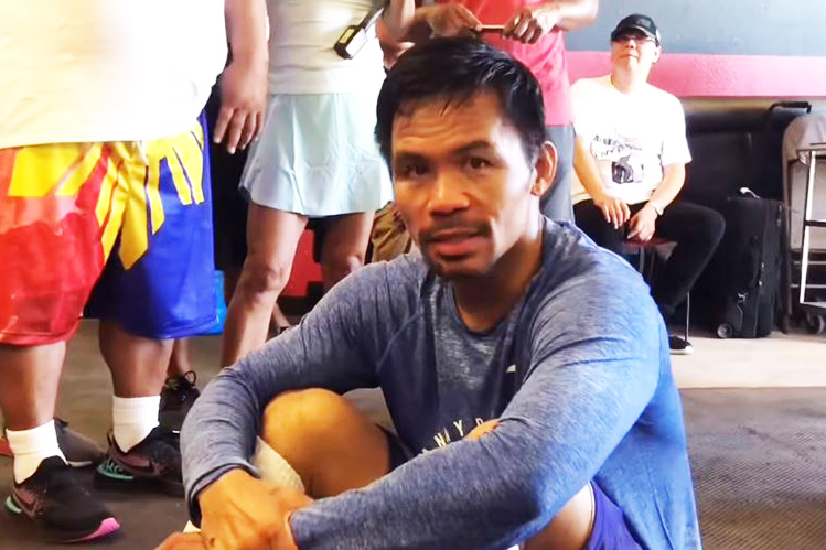 Manny Pacquiao looked confused when told that Amir Khan revealed a fight against him was a done deal