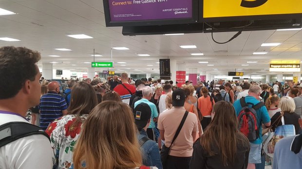 Hundreds of passengers were left standing for hours as they waited for their baggage