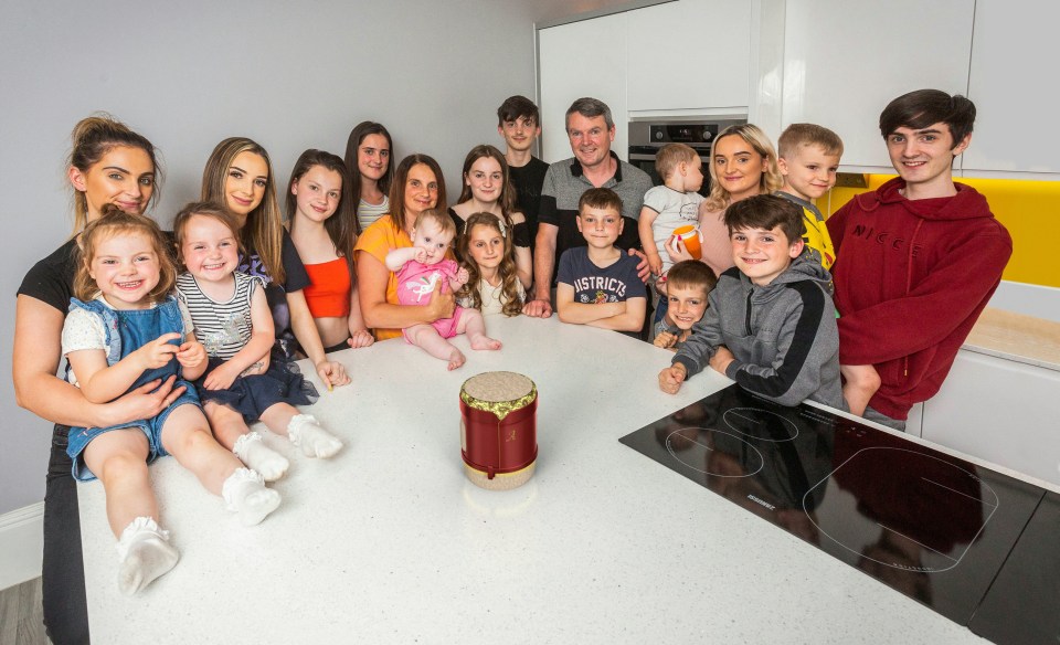  The Radford Family: (L-R) Phoebe (3), Sophie (25), Hallie (4), Chloe (23), Ellie (14), baby Bonnie (8 months), mum Sue (44), Aimee (13), Tillie (9), Archie (18 months), Katie (16), James (15), Max (10), dad Noel (48), Millie (17), Oscar (7), Caspar (6), Luke (18) and Josh (12)