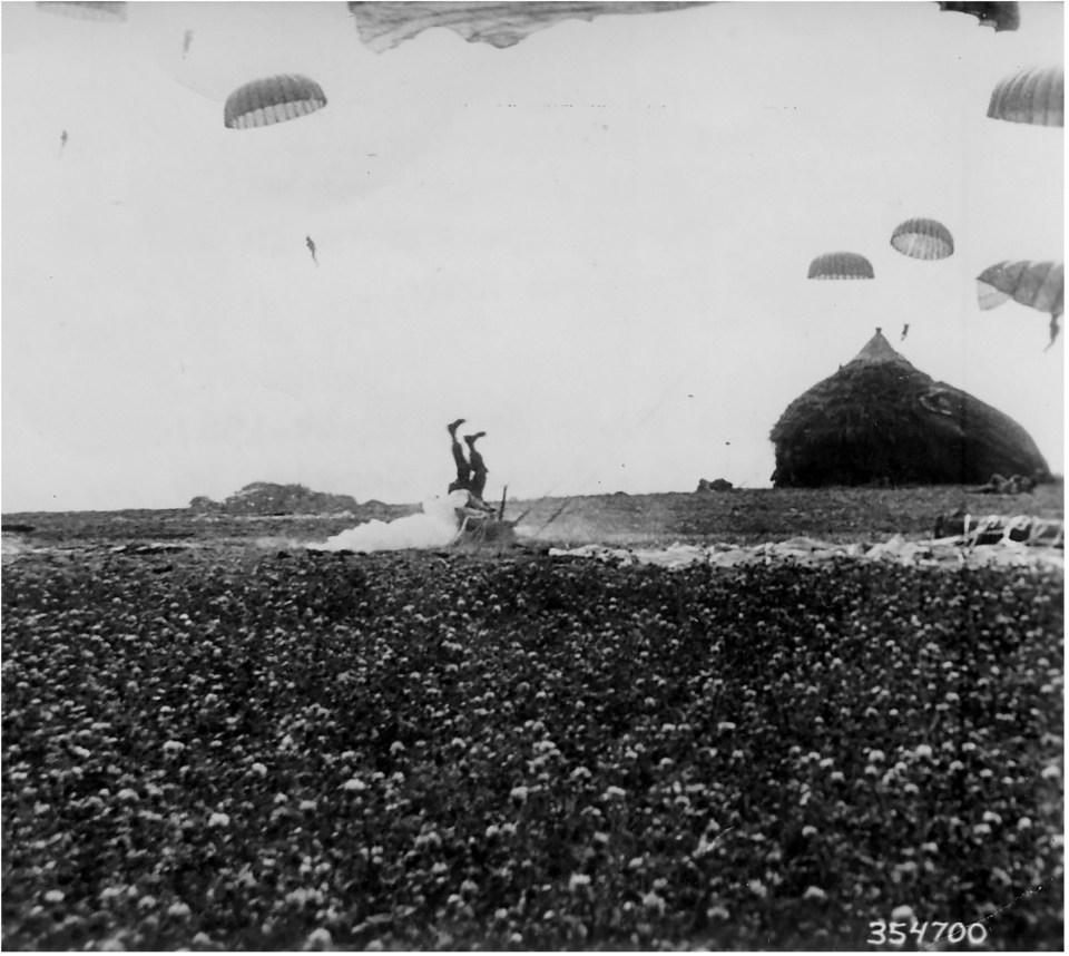  One unfortunate parachutist landed upside down near a haystack in a Dutch field