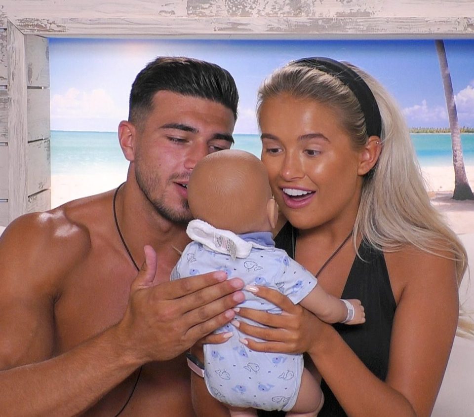  The couple with their baby Tommy 'TJ' Junior