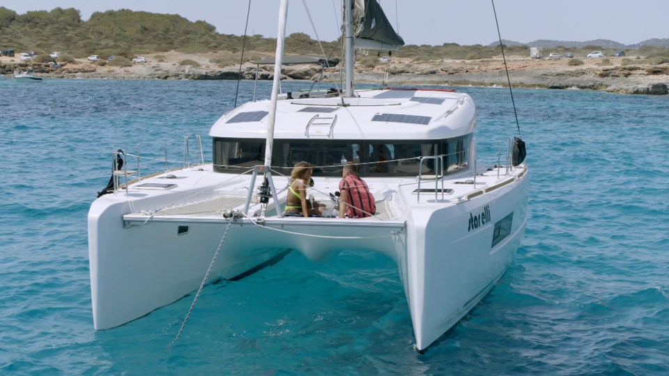  The smitten couple board a luxury catamaran for a date to remember