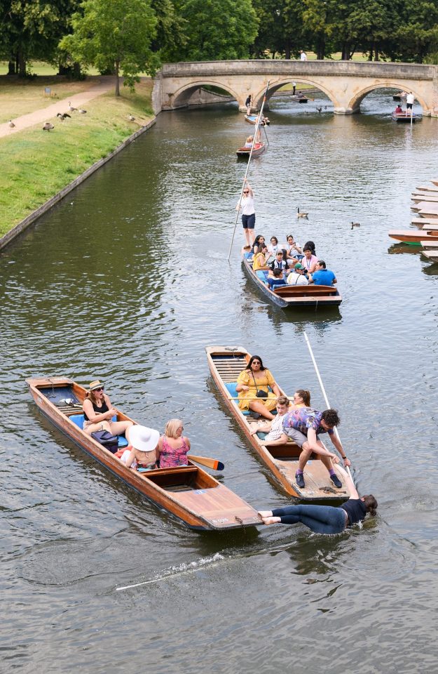  A woman takes a tumble into the River Cam in Cambridge