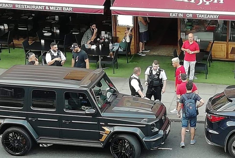  Mesut Ozil speaks with police after seeking refuge in a Turkish restaurant