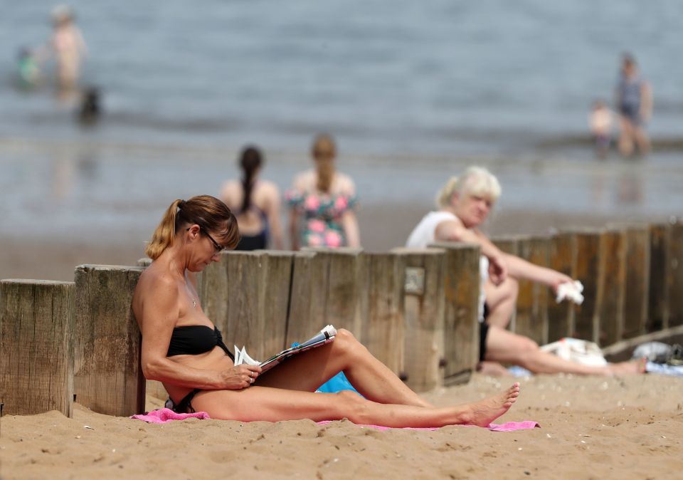  People on Portobello beach near Edinburgh enjoying the humid temperatures on Friday