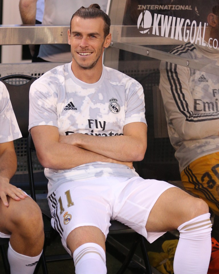  Gareth Bale sees the funny side as he watches Real Madrid get thrashed from the bench ahead of potential switch to China