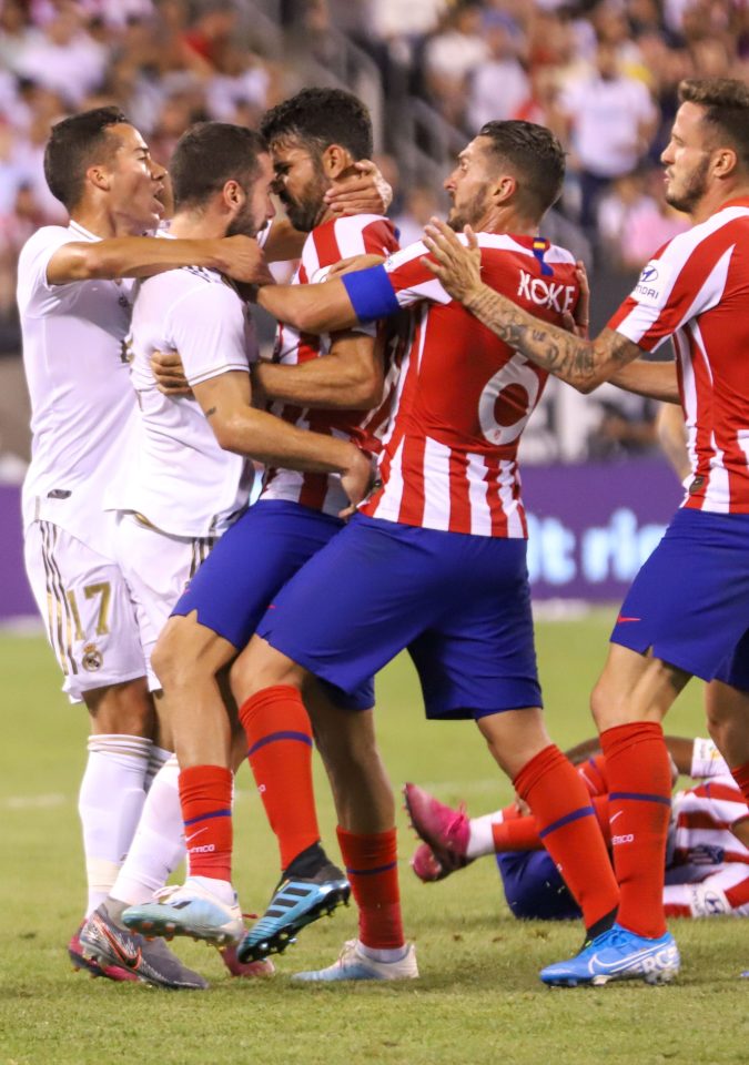 Diego Costa clashes with Dani Carvajal to spark a 22-man brawl as Atletico Madrid thrashed Real Madrid