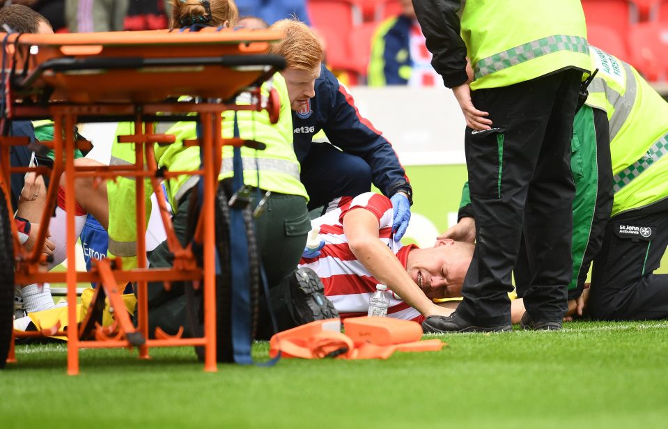  The centre-half was treated on the pitch for eight minutes after the gruesome incident