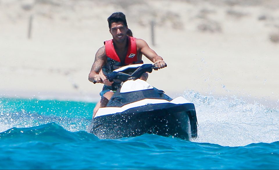  Luis Suarez makes the most of his downtime with football pals before Barcelona knuckle down for the season