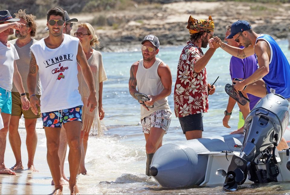  Strikers Lionel Messi and Luis Suarez were joined by former Barcelona team-mate Cesc Fabregs for a dream get-away with their families